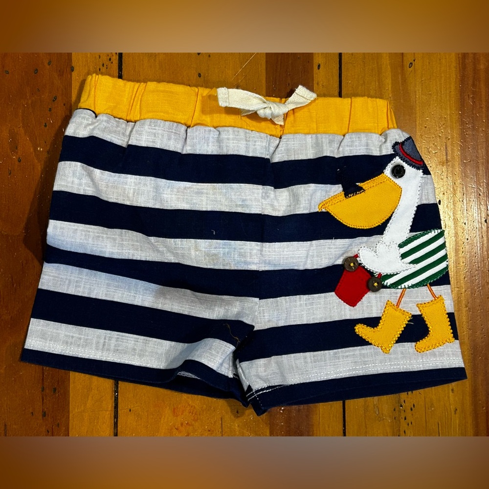 Mud Pie Pelican Swim Trunks